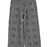Flare trousers | Grey w/ zebra print